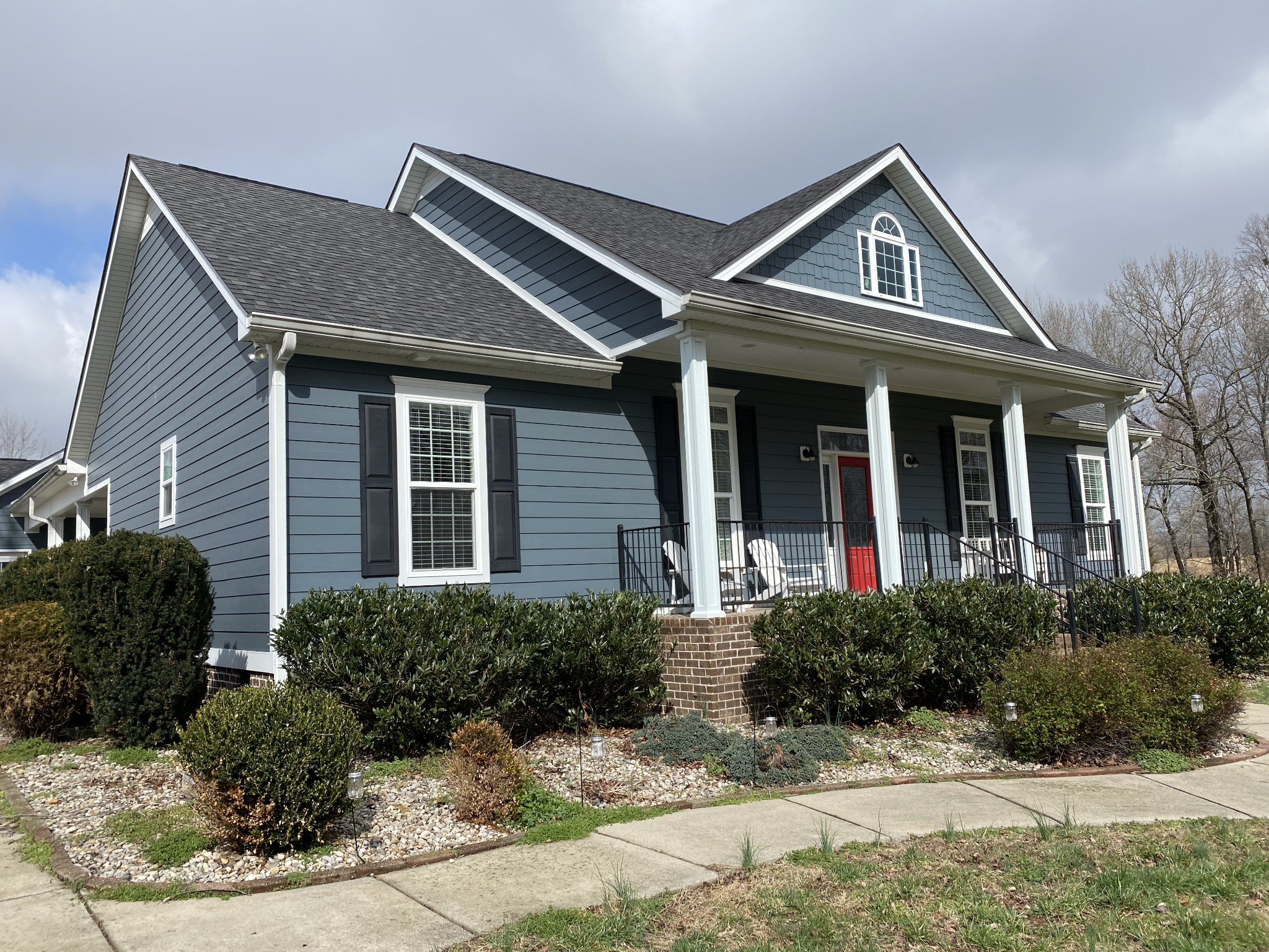 445 Moore Link Road Portland, TN 37148 - Photo 2 of 30 a front view of a house with a yard
