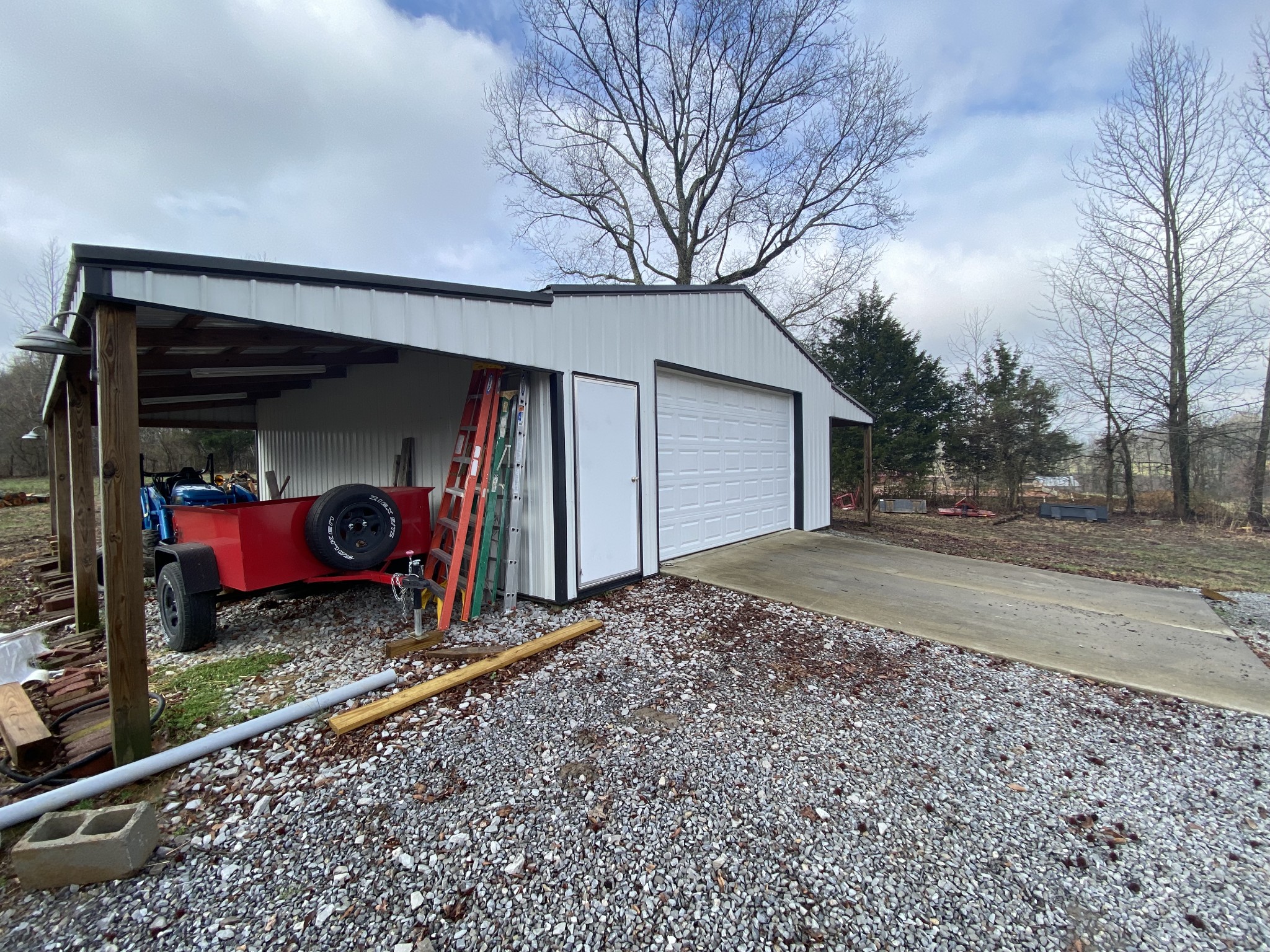445 Moore Link Road Portland, TN 37148 - Photo 26 of 30 a view of a house with a yard