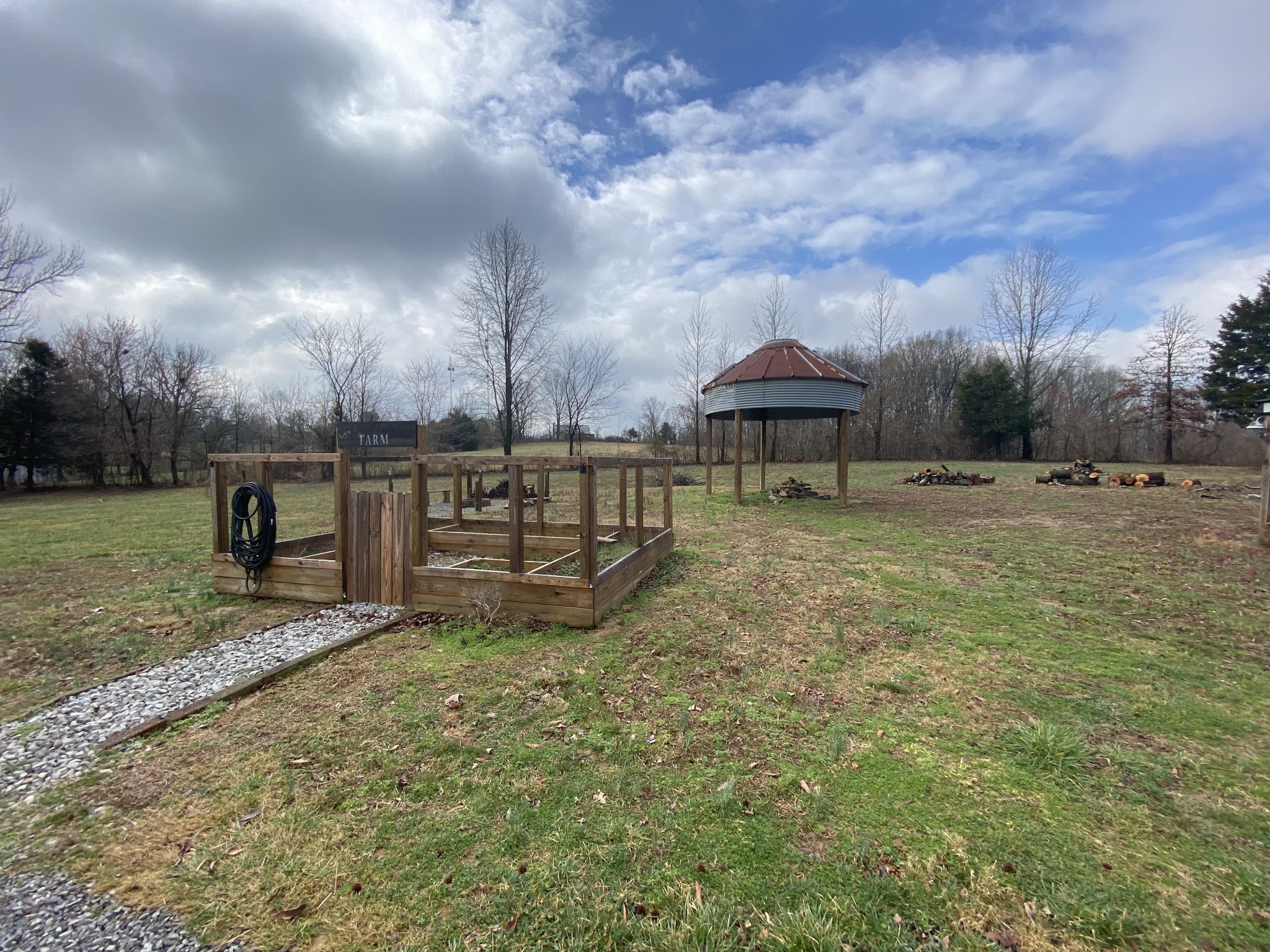 445 Moore Link Road Portland, TN 37148 - Photo 29 of 30 a view of a yard with wooden fence