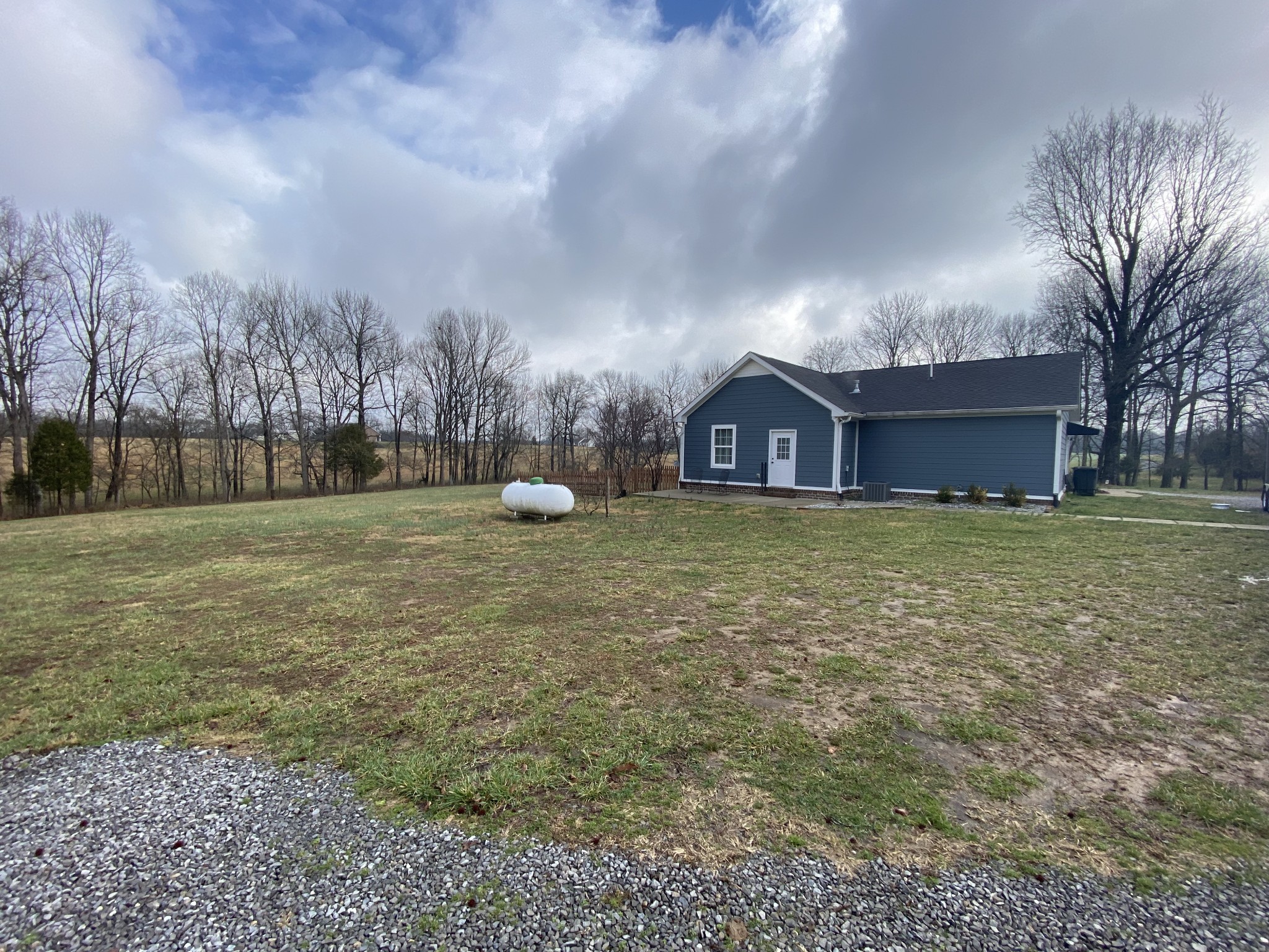445 Moore Link Road Portland, TN 37148 - Photo 30 of 30 a view of a house with a yard