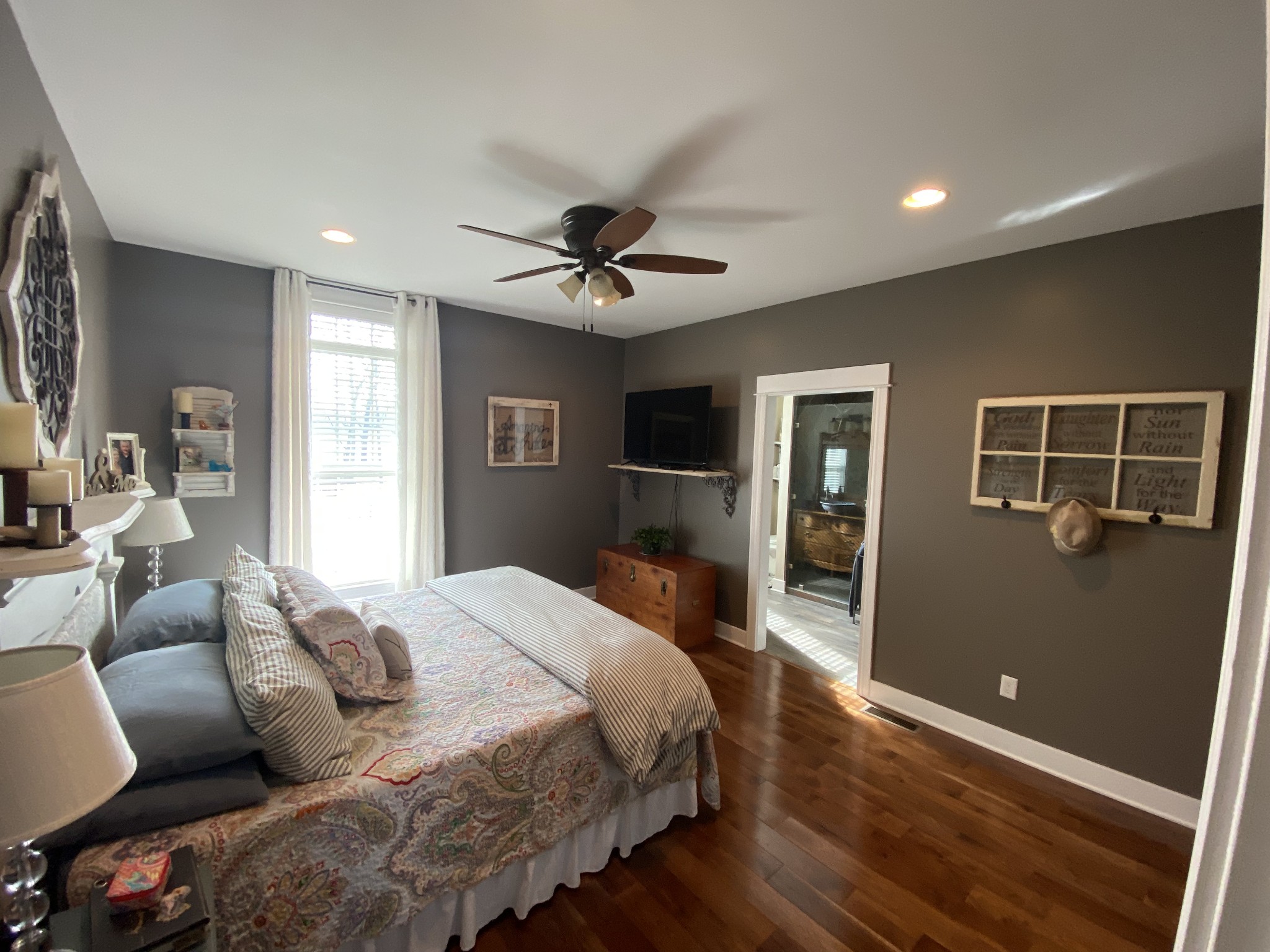 445 Moore Link Road Portland, TN 37148 - Photo 10 of 30 a bedroom with furniture and a wooden floor