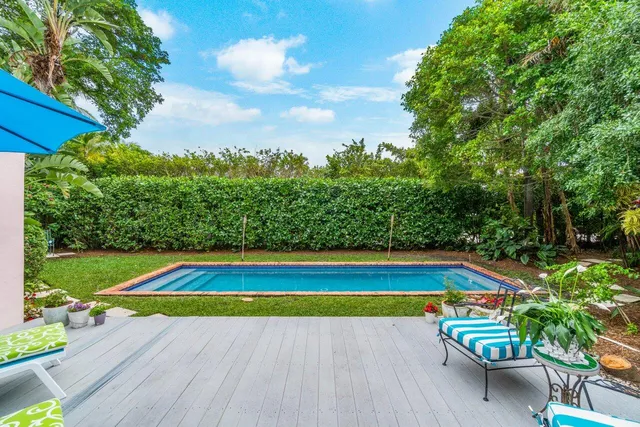 a view of an outdoor space pool patio and garden