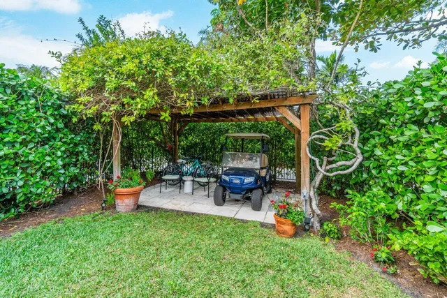 an outdoor view of a garden with patio