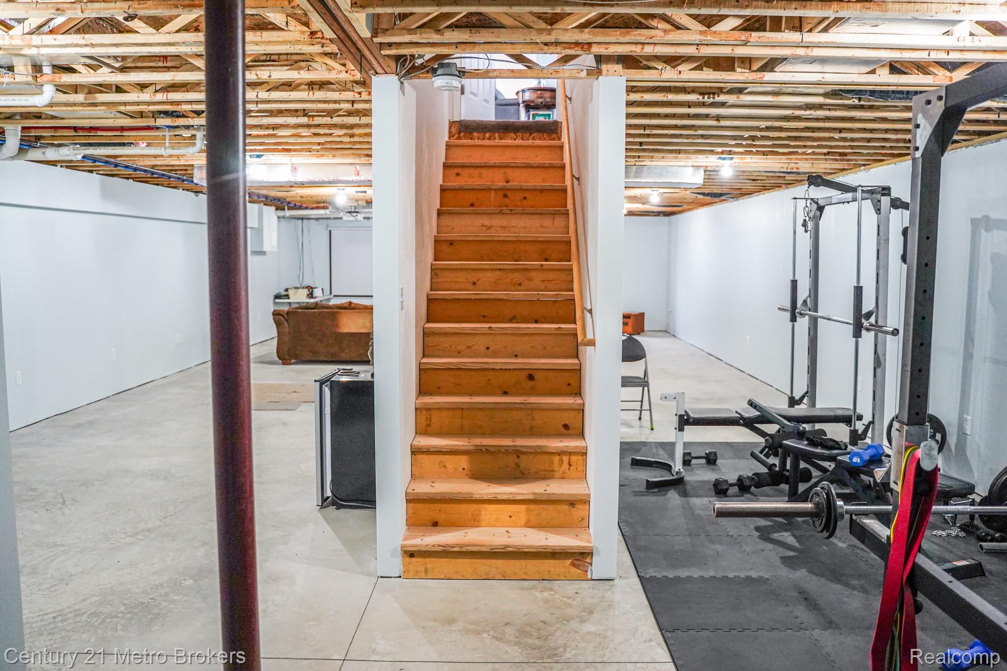 6449 Oliver Road Fostoria, MI 48435 - Photo 14 of 17 Exercise area featuring concrete flooring