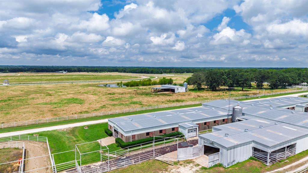 4509 Diamond D Road Lone Oak, TX 75453 - Photo 9 of 36 an aerial view of residential houses with outdoor space and swimming pool