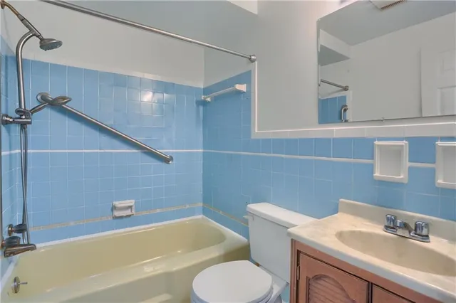 a bathroom with a sink and a bathtub