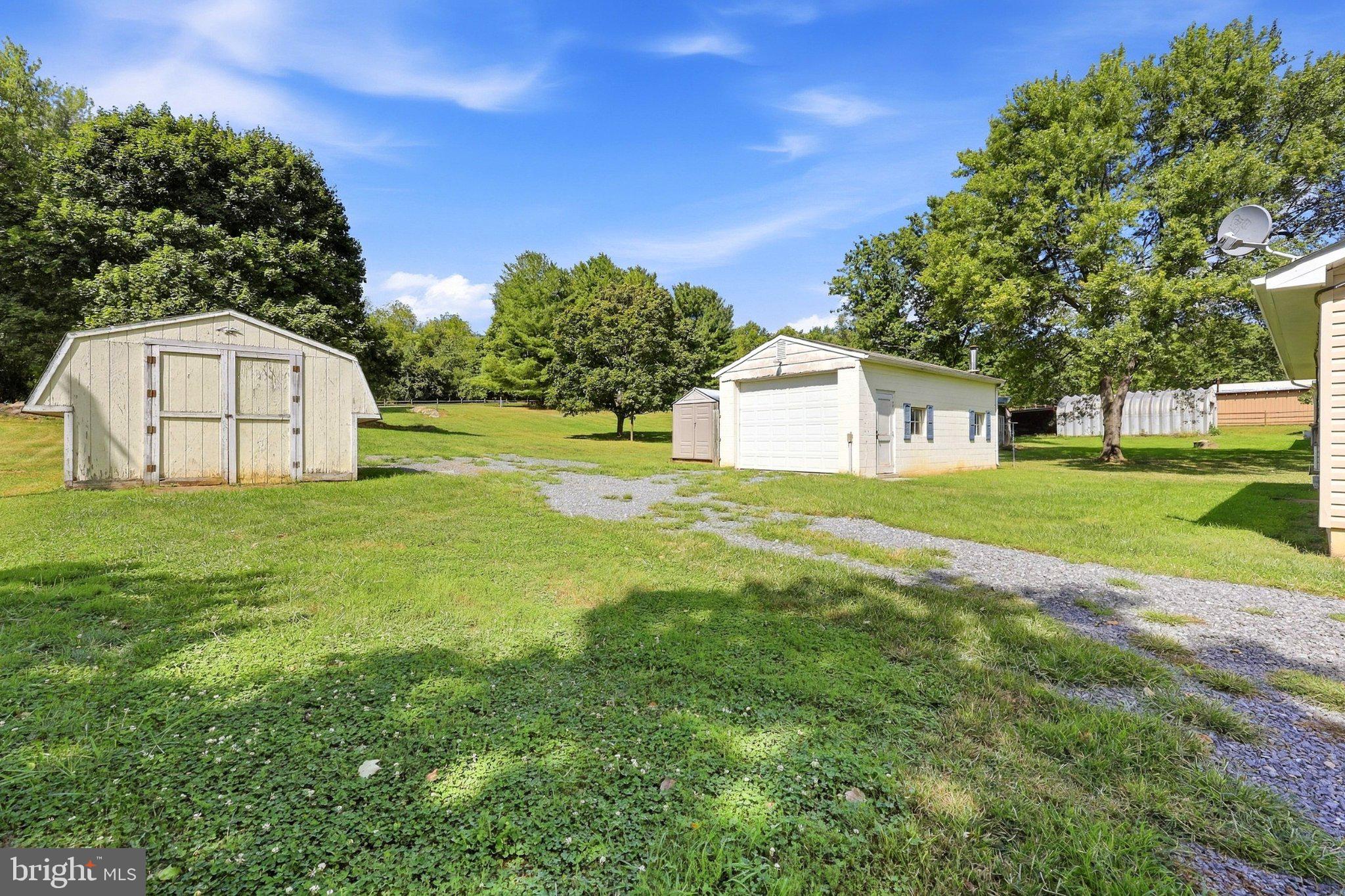 589 Ruebuck Road Clear Brook, VA 22624 - Photo 5 of 37 Garage and several sheds