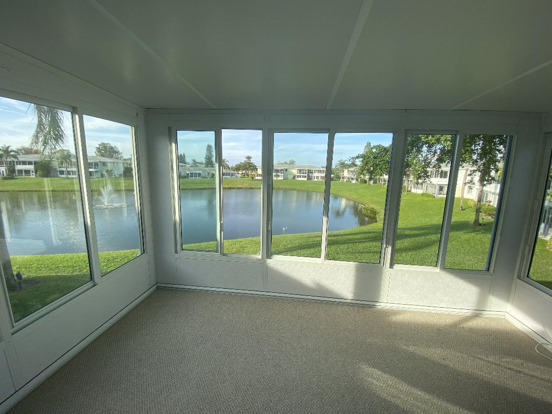 2731 Southwest 15th Street, Unit 203 Delray Beach, FL 33445 - Photo 1 of 15 Screened patio
