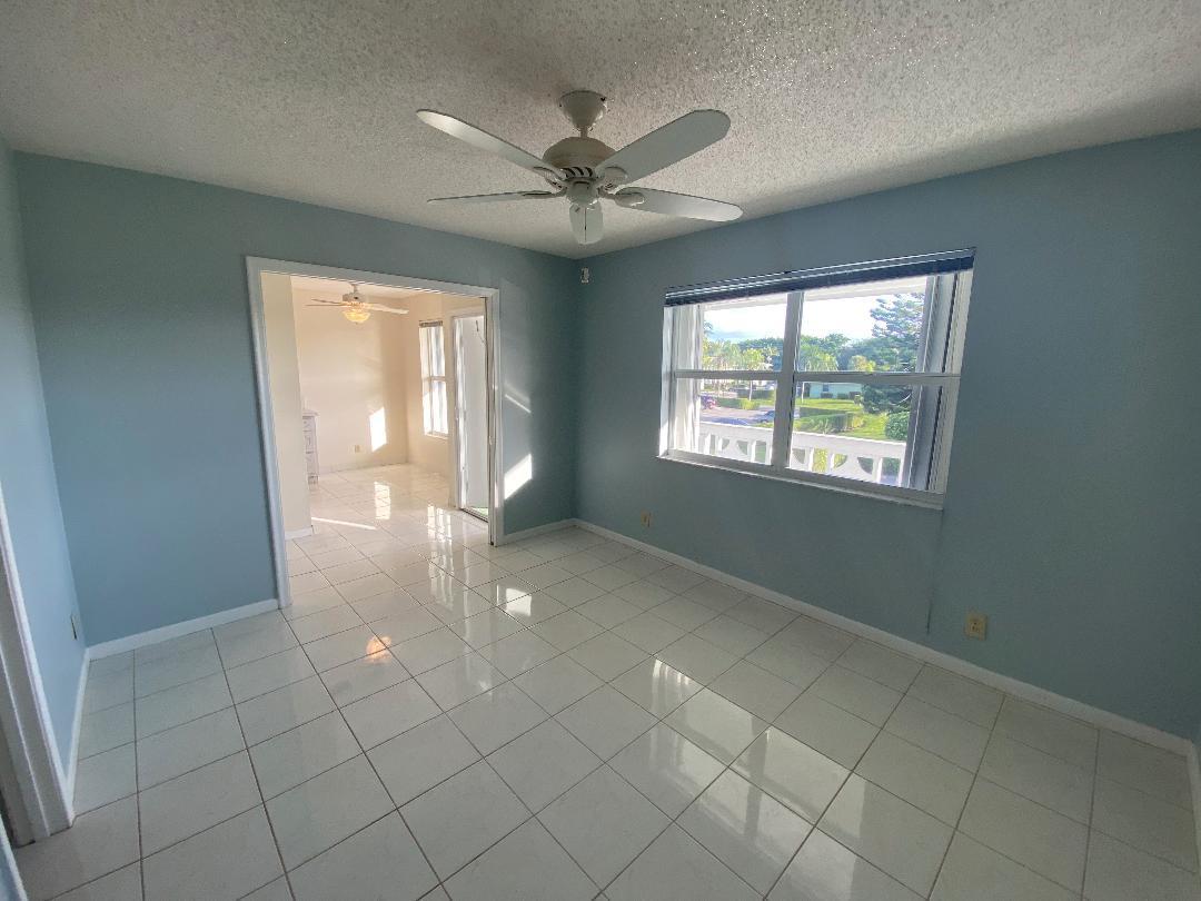 2731 Southwest 15th Street, Unit 203 Delray Beach, FL 33445 - Photo 12 of 15 Guest bedroom