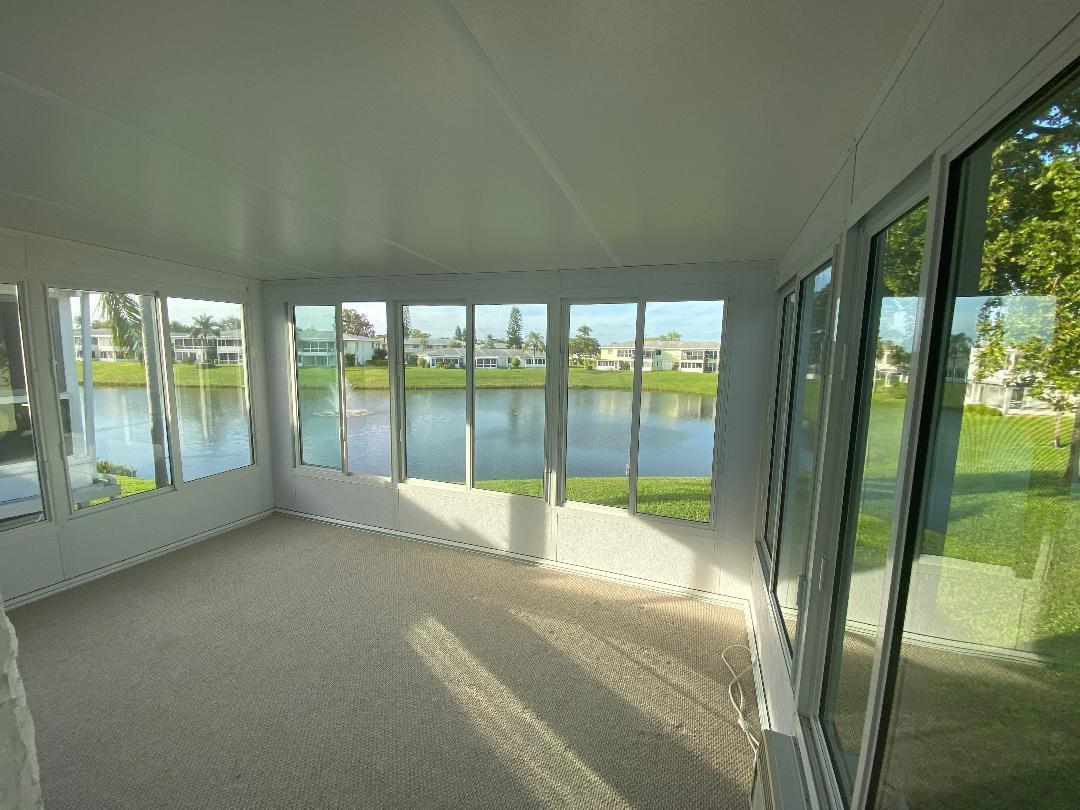 2731 Southwest 15th Street, Unit 203 Delray Beach, FL 33445 - Photo 14 of 15 Screened patio