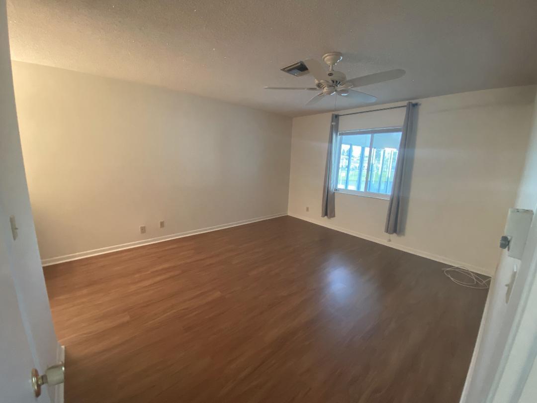 2731 Southwest 15th Street, Unit 203 Delray Beach, FL 33445 - Photo 9 of 15 Master bedroom