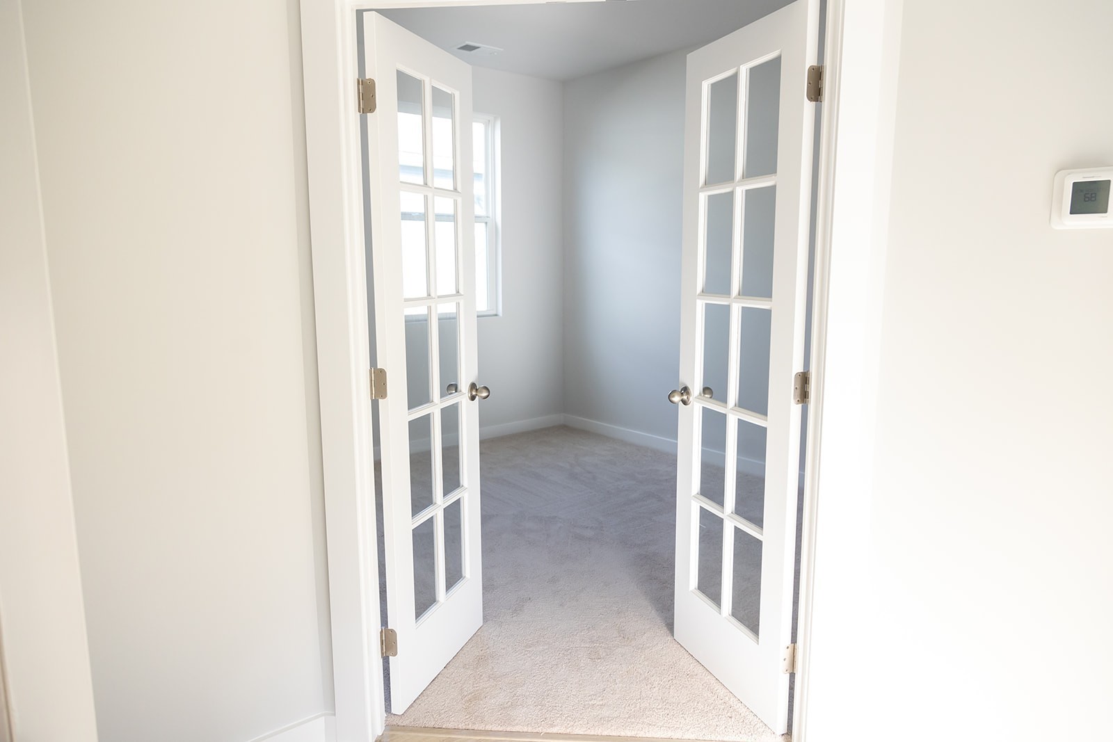 329 Apollo Way Gallatin, TN 37066 - Photo 7 of 46 a view of a kitchen from a hallway