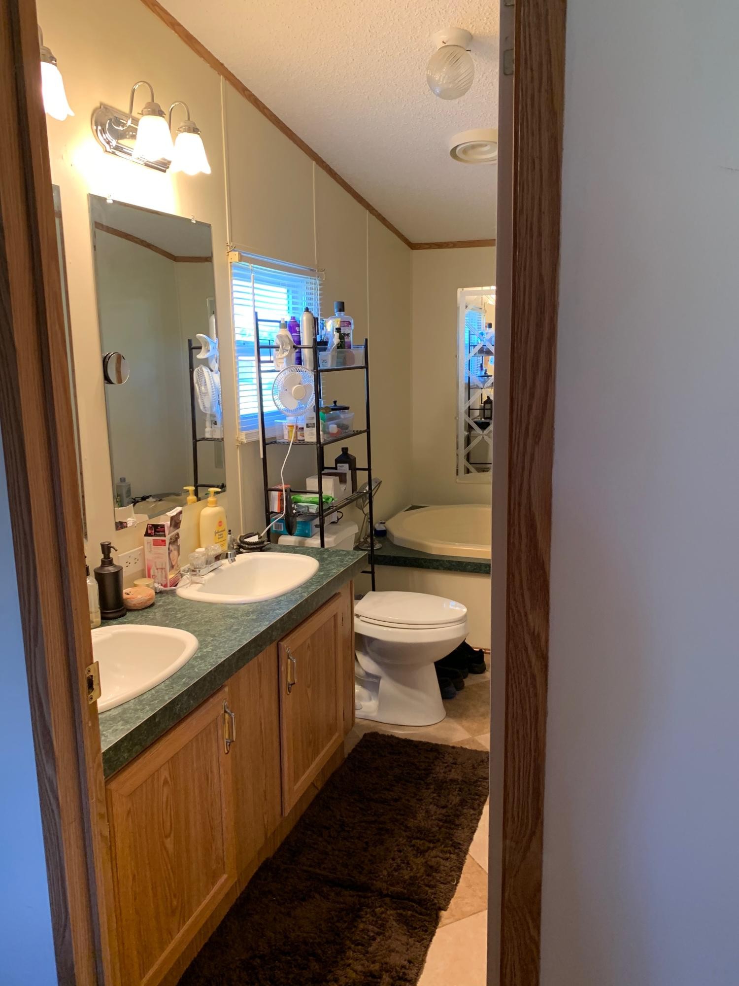 4962 Corinth Church Road Loudon, TN 37774 - Photo 14 of 18 a en suite bathroom with a granite countertop sink and a mirror