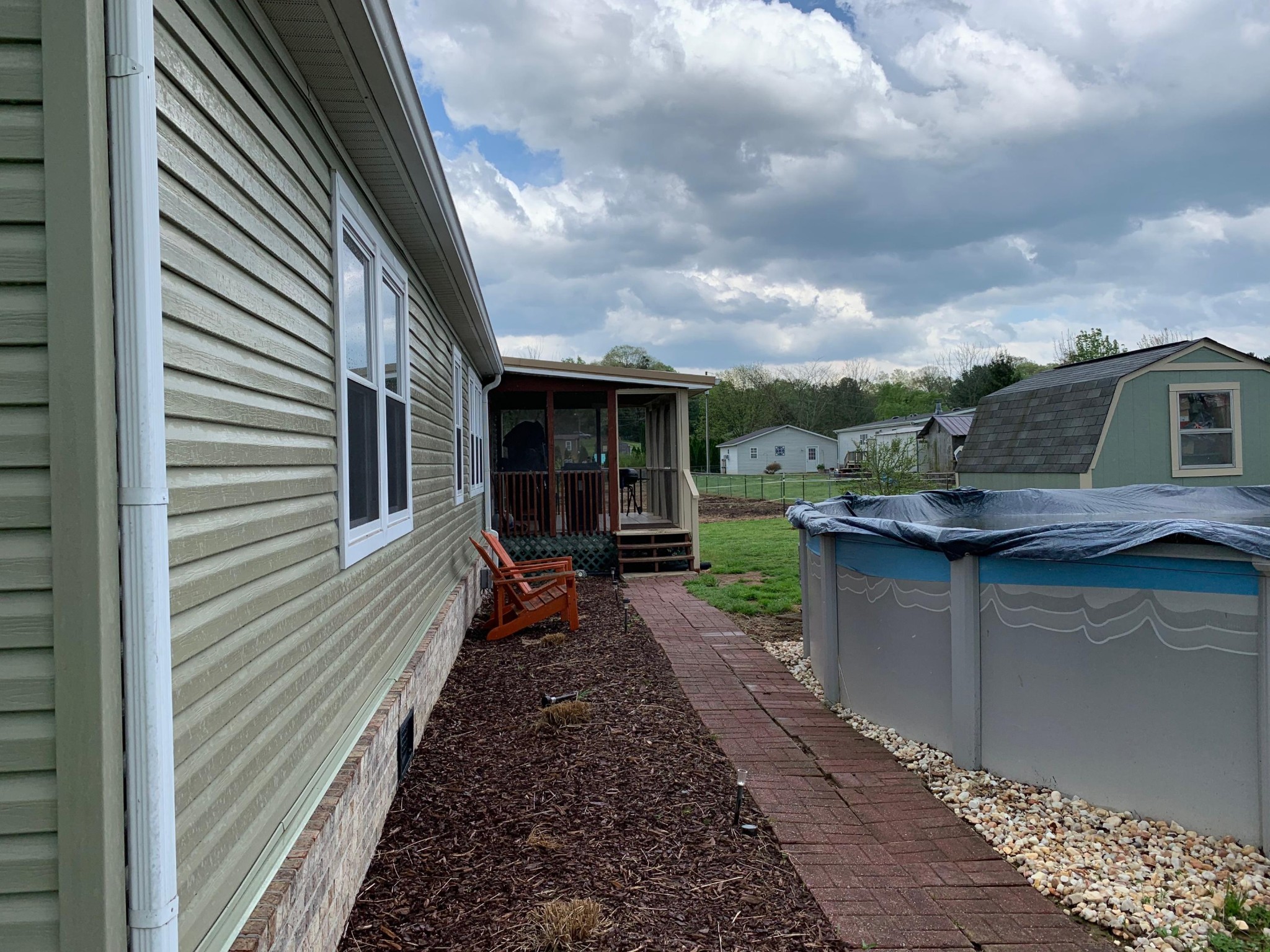 4962 Corinth Church Road Loudon, TN 37774 - Photo 5 of 18 a backyard of a house with seating space