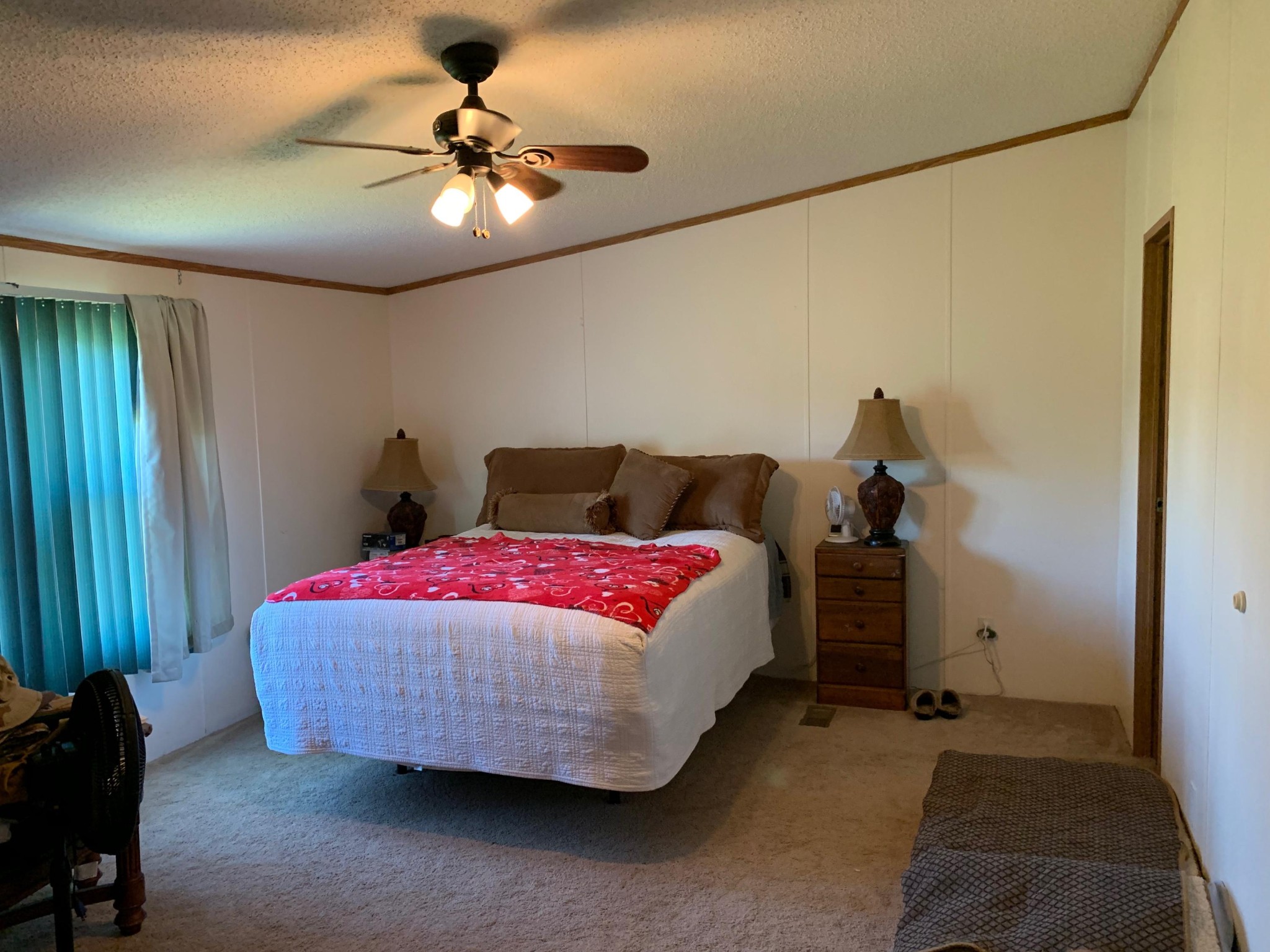 4962 Corinth Church Road Loudon, TN 37774 - Photo 10 of 18 a bedroom with a bed and a chandelier fan