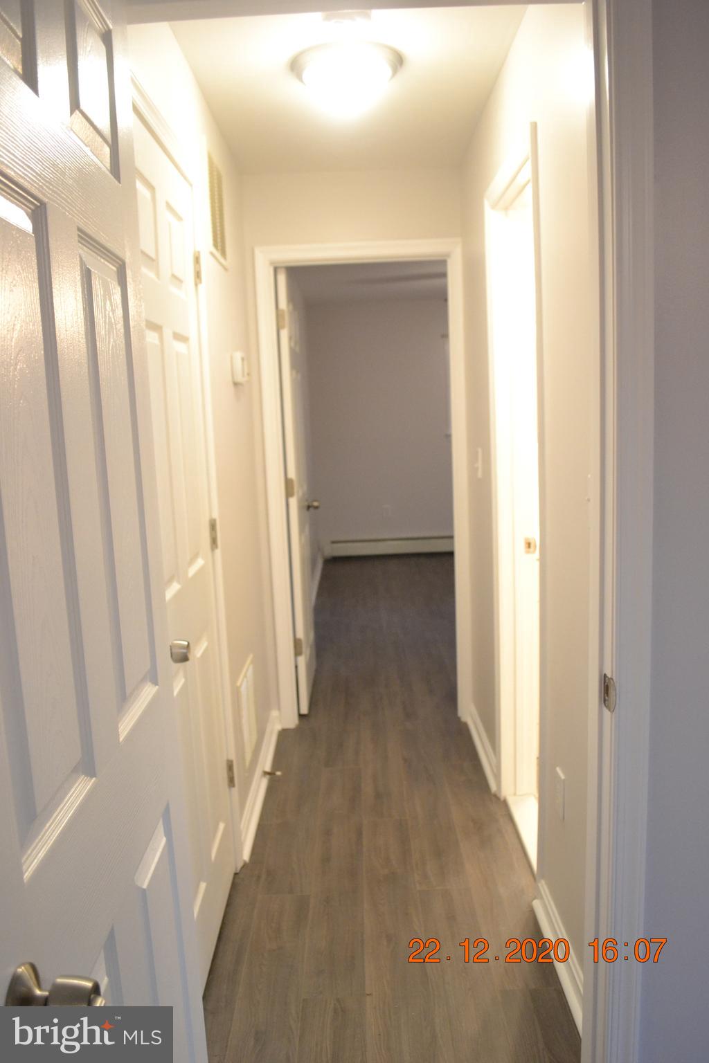 7786 West Shore Road Pasadena, MD 21122 - Photo 13 of 51 Light gray paint and beautiful floors