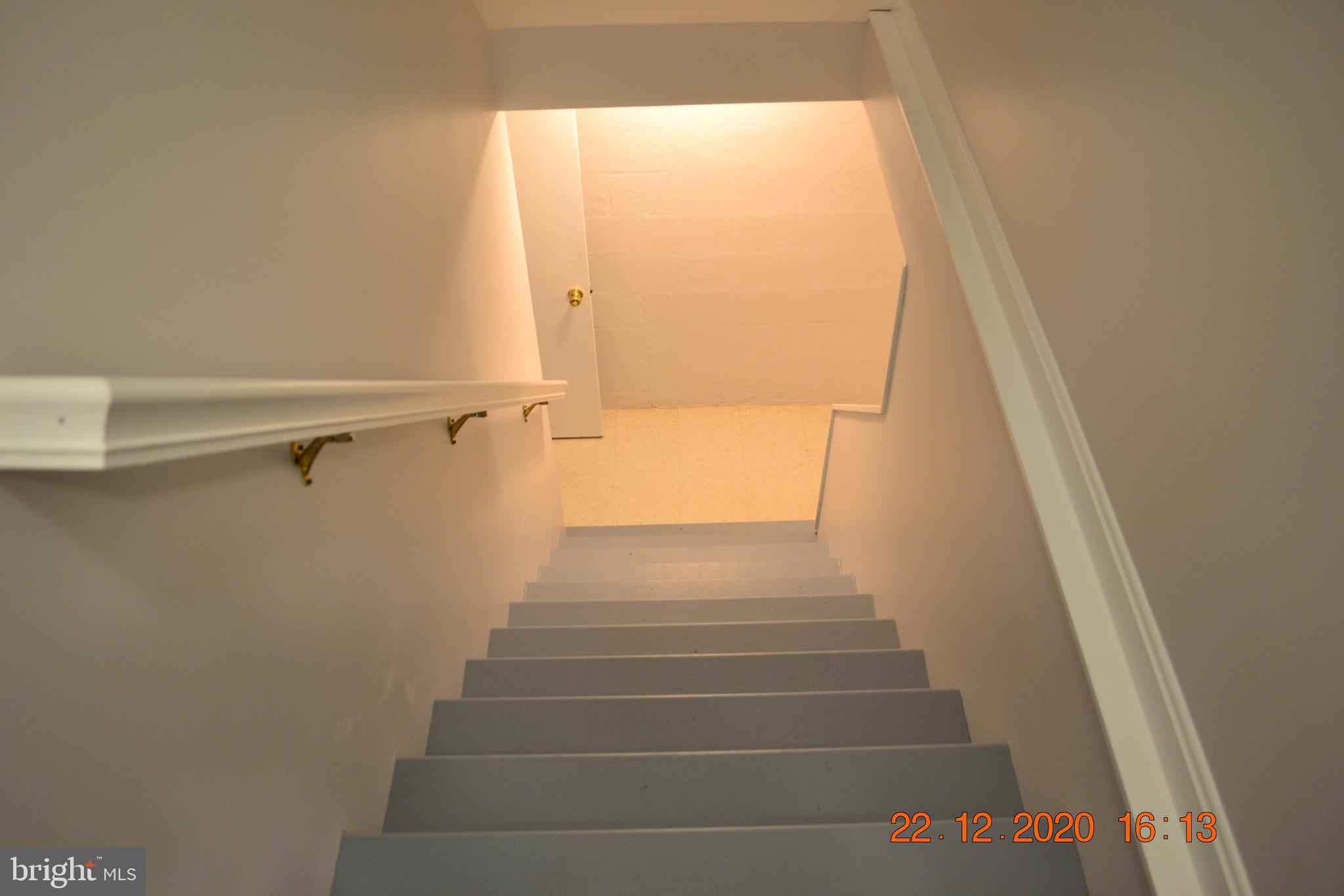 7786 West Shore Road Pasadena, MD 21122 - Photo 32 of 51 Stairs down to lower level