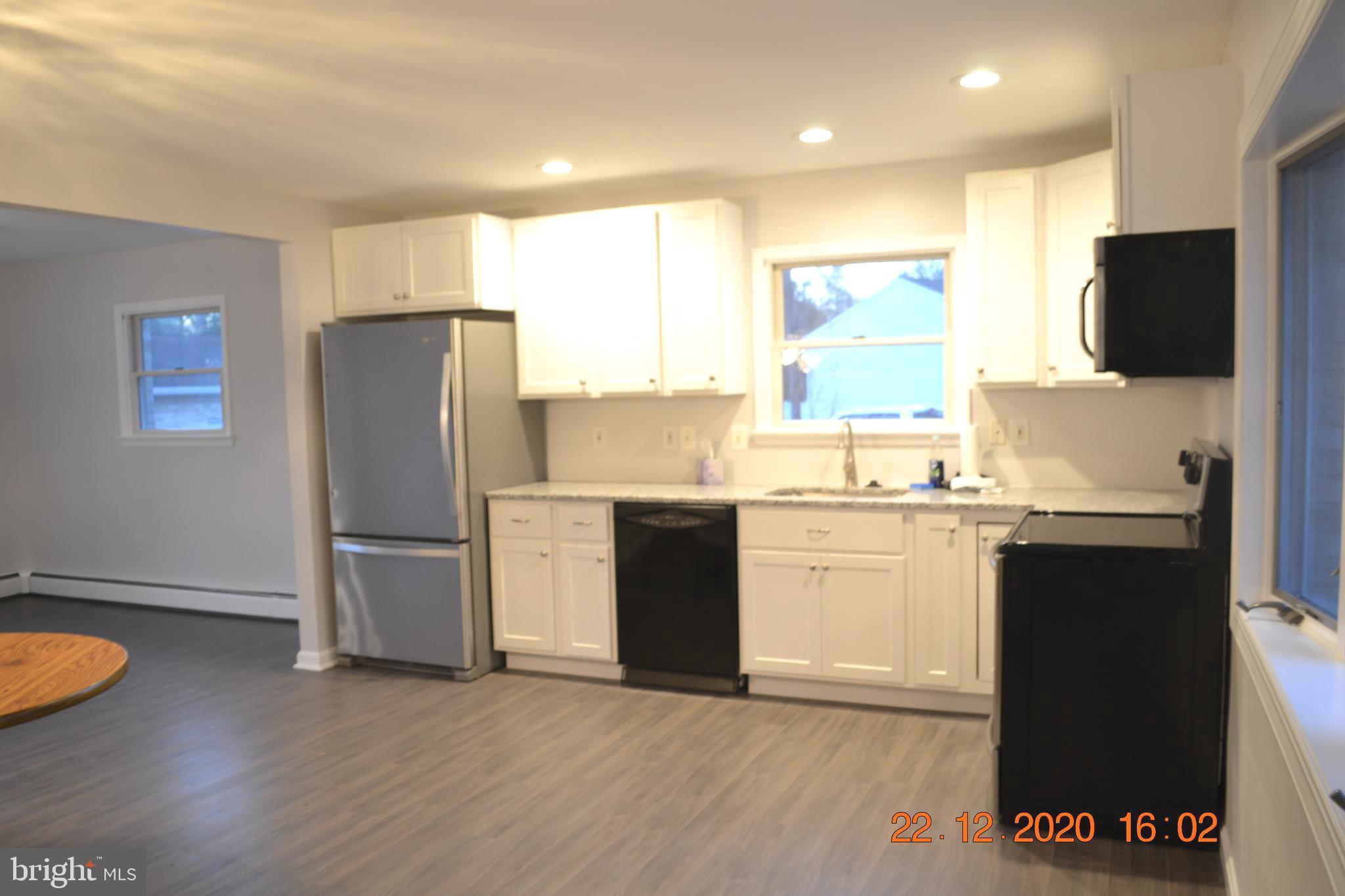 7786 West Shore Road Pasadena, MD 21122 - Photo 10 of 51 Completely new kitchen and marble countertops