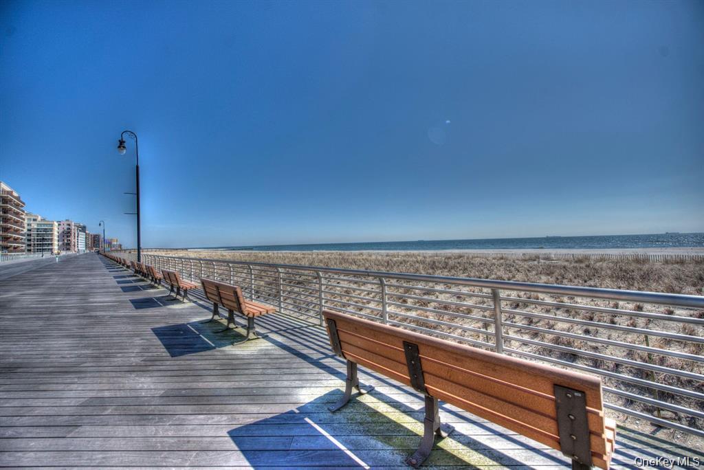 522 Shore Road, Unit 1D Long Beach, NY 11561 - Photo 21 of 22 a view of wooden floor with a bench