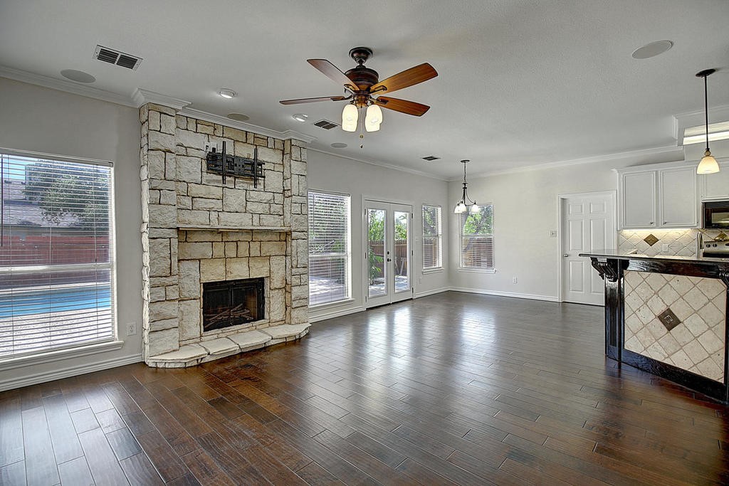 5101 Cavendish Drive Corpus Christi, TX 78413 - Photo 15 of 40 a view of an empty room with a fireplace and a window