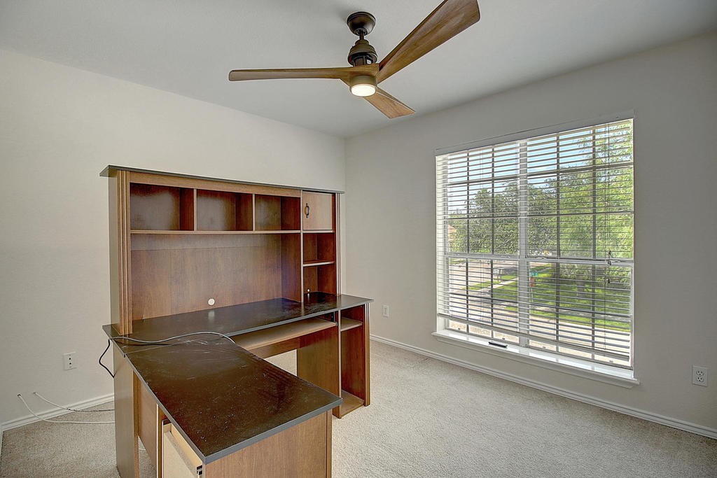 5101 Cavendish Drive Corpus Christi, TX 78413 - Photo 36 of 40 a kitchen with stainless steel appliances granite countertop a stove a sink dishwasher and a microwave oven