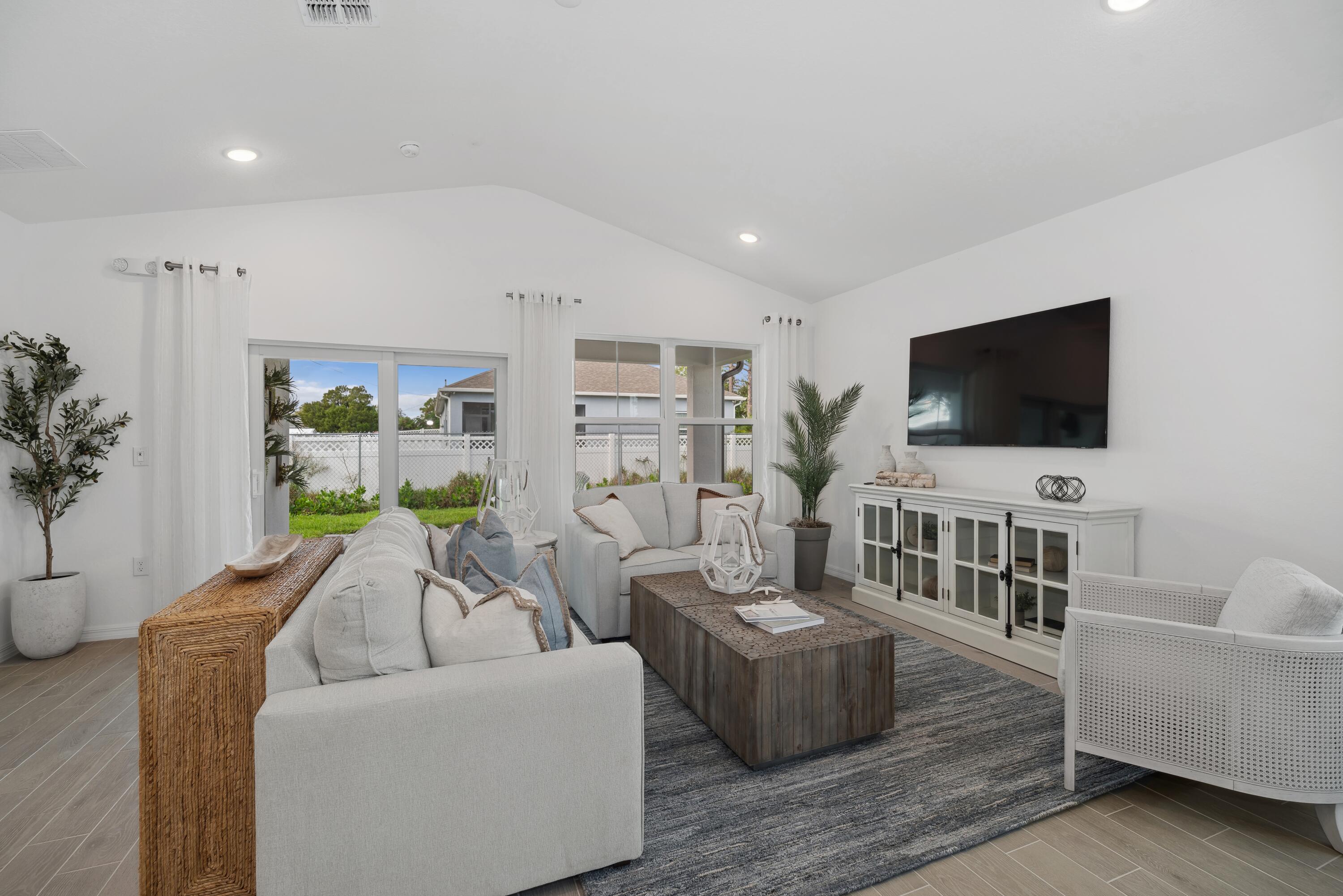 1665 Wyoming Drive Southeast, Unit 100 Palm Bay, FL 32909 - Photo 18 of 29 Great Room