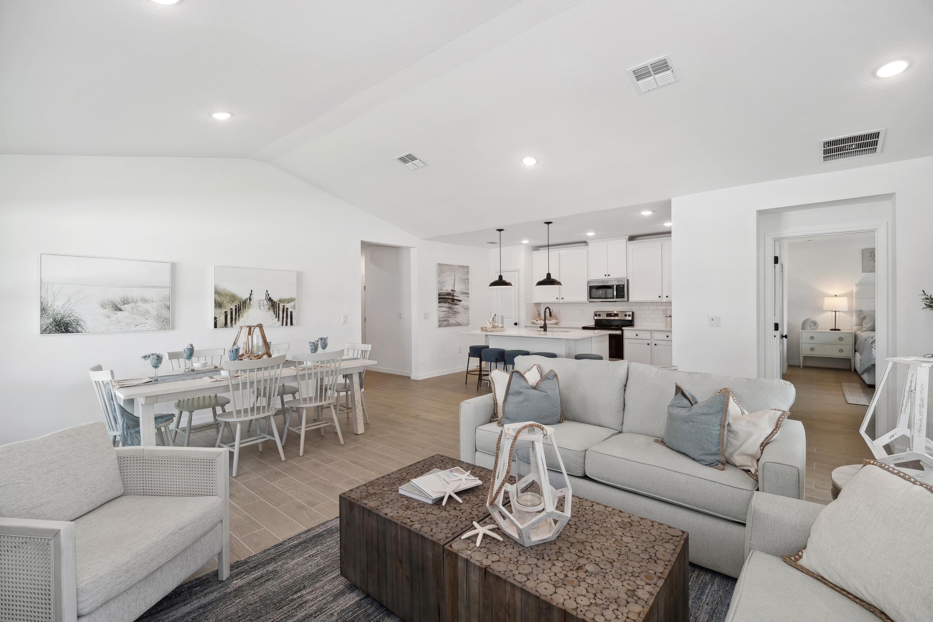 1665 Wyoming Drive Southeast, Unit 100 Palm Bay, FL 32909 - Photo 21 of 29 Great Room, Dining Area & Kitchen