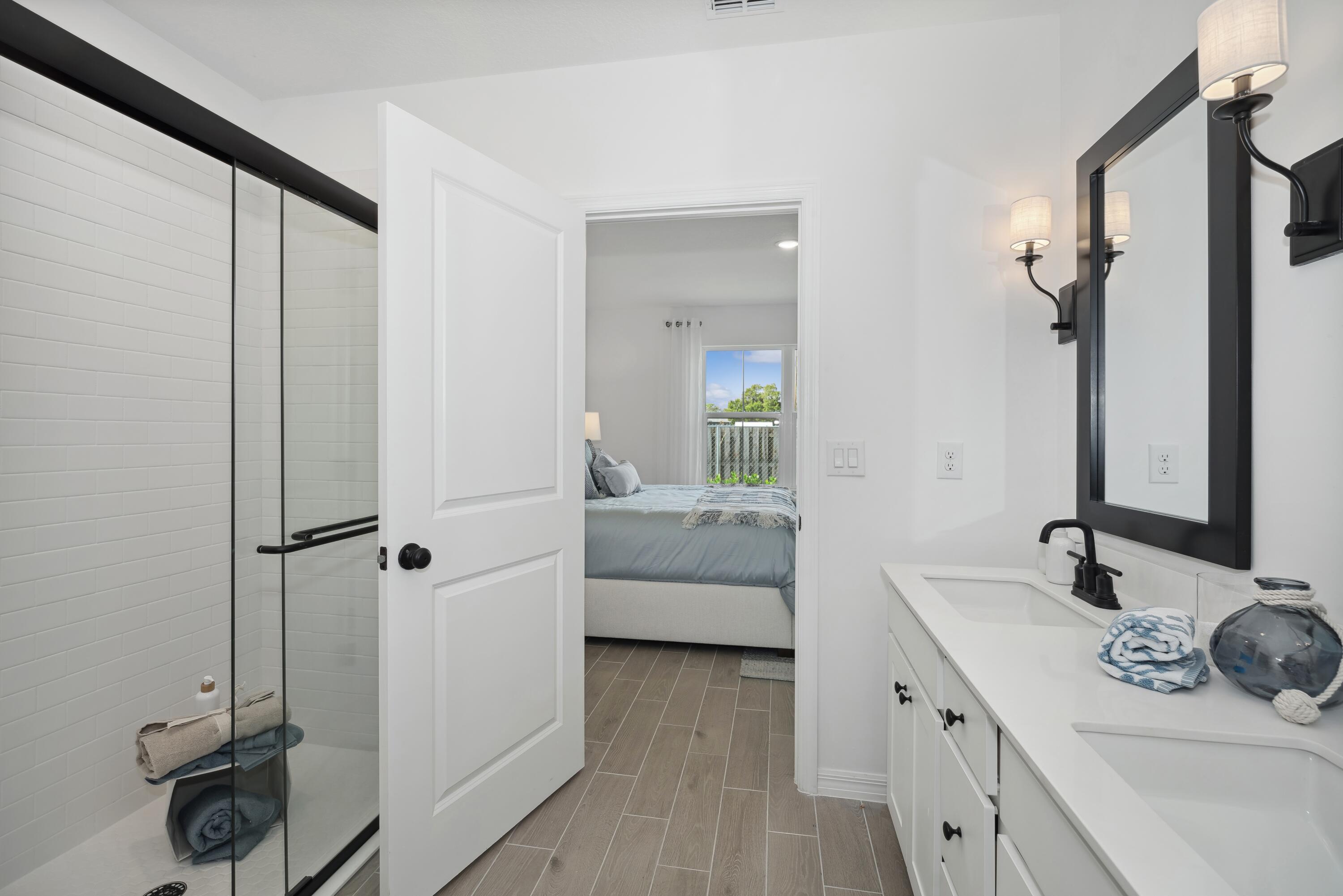 1665 Wyoming Drive Southeast, Unit 100 Palm Bay, FL 32909 - Photo 25 of 29 Primary Bath