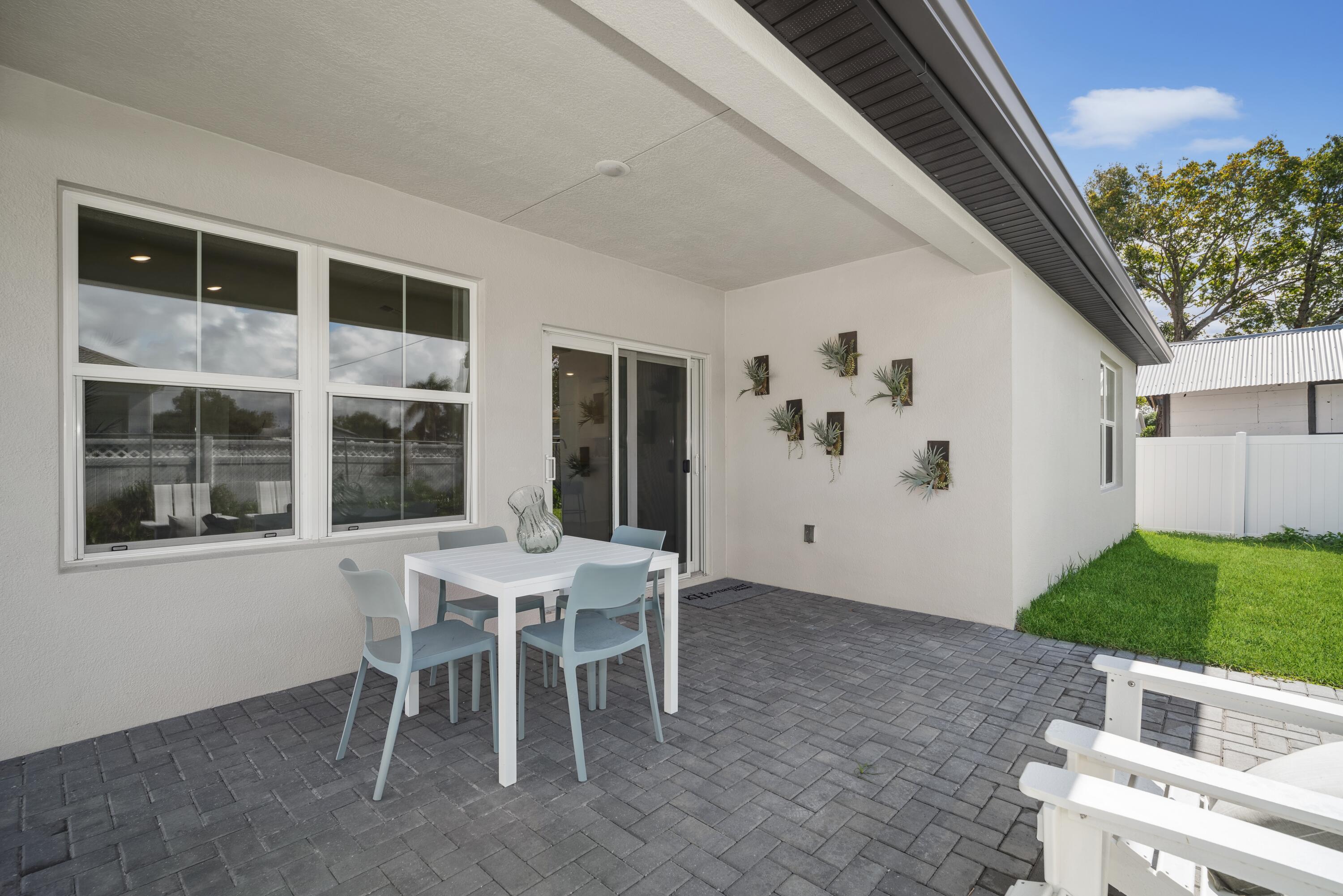 1665 Wyoming Drive Southeast, Unit 100 Palm Bay, FL 32909 - Photo 27 of 29 Covered Patio