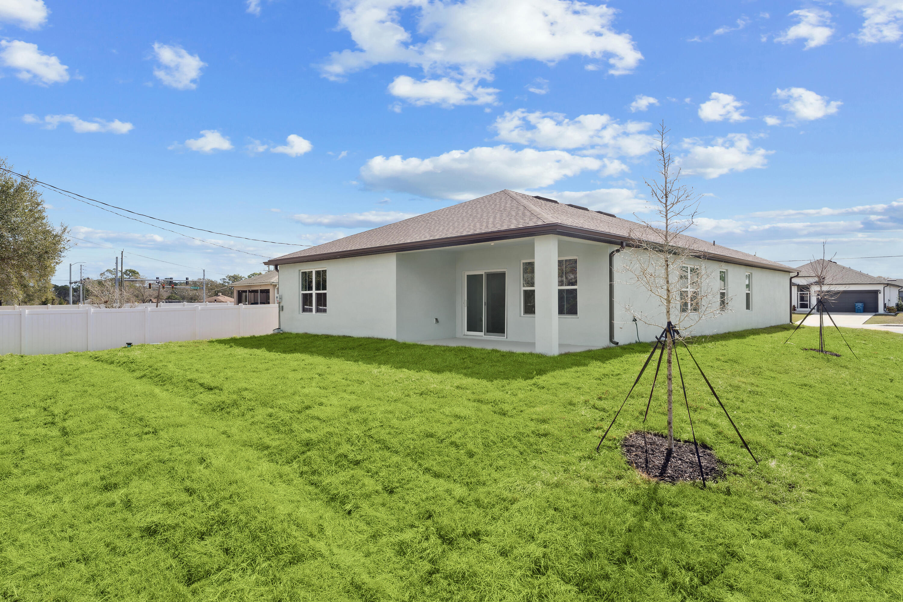 1665 Wyoming Drive Southeast, Unit 100 Palm Bay, FL 32909 - Photo 28 of 29 Rear Exterior