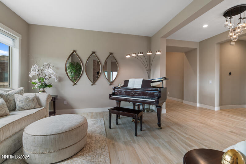 8900 Suncreek Court Reno, NV 89523 - Photo 11 of 74 a living room with furniture and wooden floor