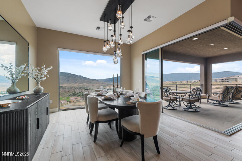 8900 Suncreek Court Reno, NV 89523 - Photo 19 of 74 a view of a dining room with furniture window and outside view