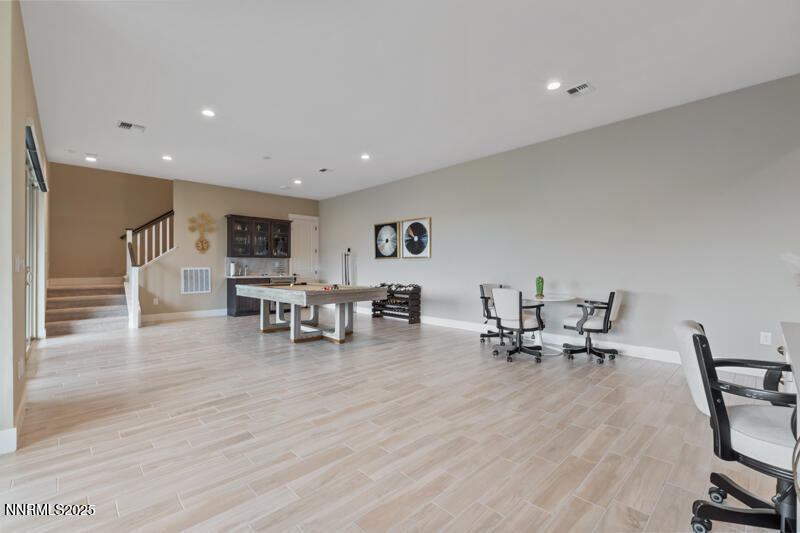 8900 Suncreek Court Reno, NV 89523 - Photo 40 of 74 a living room with furniture and wooden floor