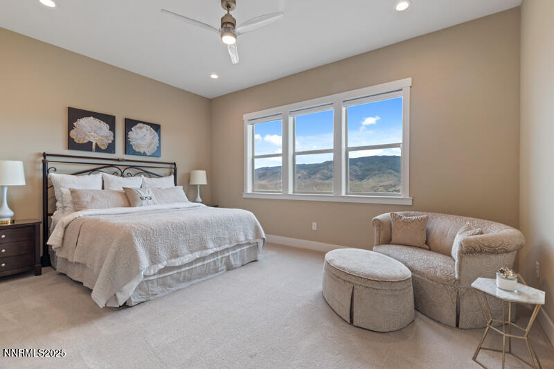 8900 Suncreek Court Reno, NV 89523 - Photo 45 of 74 a bedroom with a bed and a couch