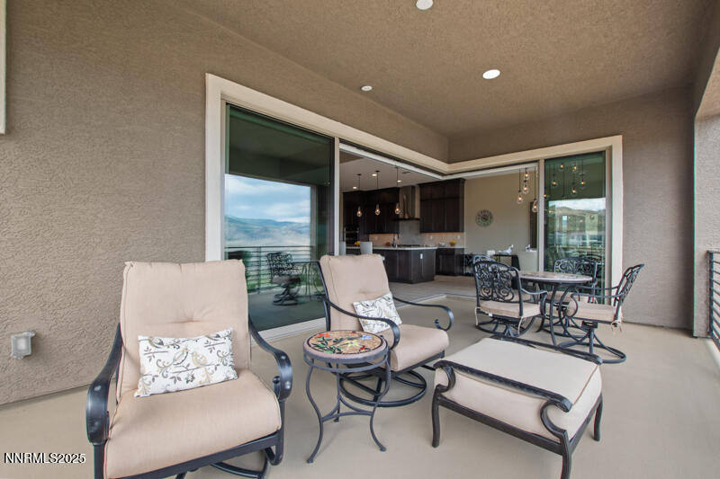 8900 Suncreek Court Reno, NV 89523 - Photo 51 of 74 a living room with furniture and a large window