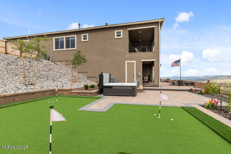 8900 Suncreek Court Reno, NV 89523 - Photo 61 of 74 a front view of a house with swimming pool garden and patio