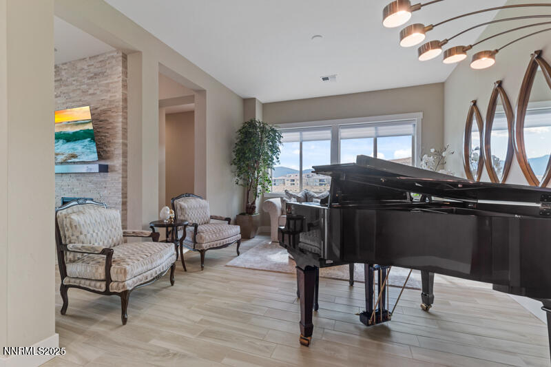 8900 Suncreek Court Reno, NV 89523 - Photo 10 of 74 a living room with furniture and a window