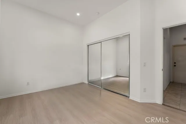a spacious bathroom with a bathtub shower and sink