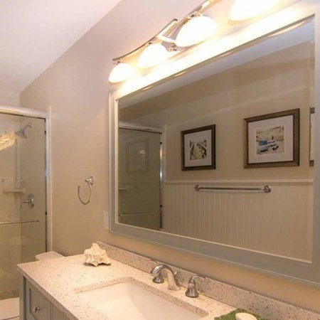 10 Codman Spring Road Edgartown, MA 02539 - Photo 19 of 32 a bathroom with a sink and a mirror