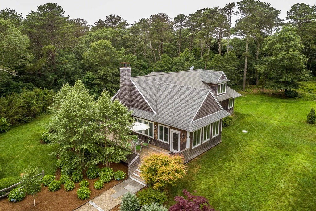 10 Codman Spring Road Edgartown, MA 02539 - Photo 30 of 32 front view of a house with a yard