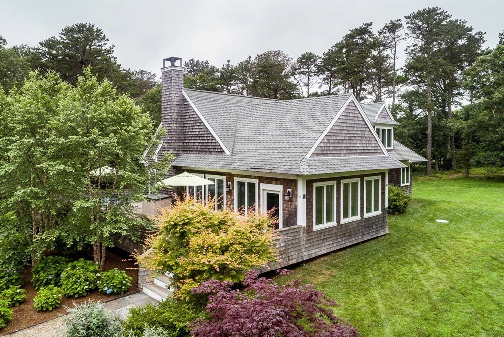 10 Codman Spring Road Edgartown, MA 02539 - Photo 4 of 32 a aerial view of a house with swimming pool and garden