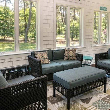 10 Codman Spring Road Edgartown, MA 02539 - Photo 10 of 32 a living room with furniture and a rug