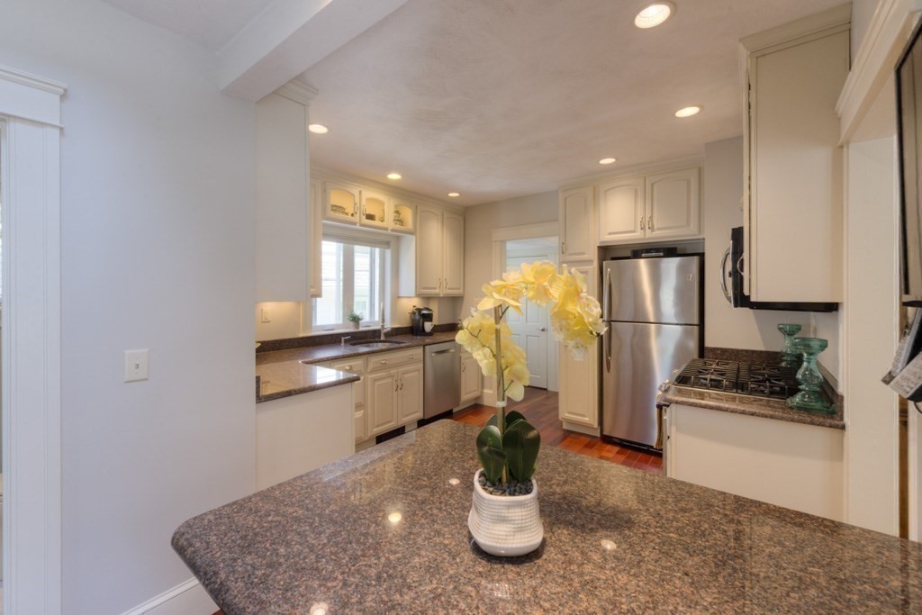 46 Eagle Road Worcester, MA 01605 - Photo 14 of 42 a kitchen with refrigerator and stove