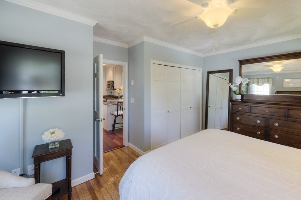 46 Eagle Road Worcester, MA 01605 - Photo 19 of 42 a bedroom with a bed and a flat screen tv