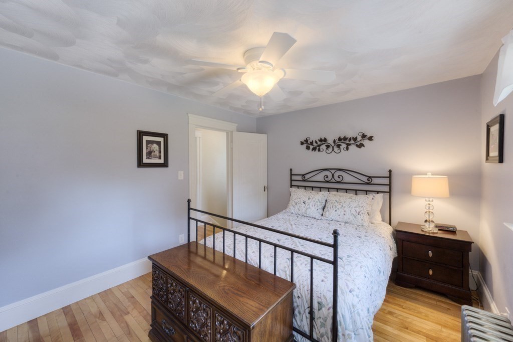 46 Eagle Road Worcester, MA 01605 - Photo 23 of 42 a living room with furniture and a chandelier