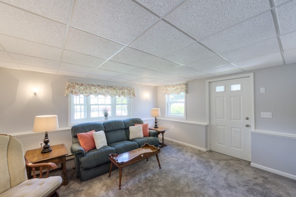 46 Eagle Road Worcester, MA 01605 - Photo 32 of 42 a living room with furniture and a window