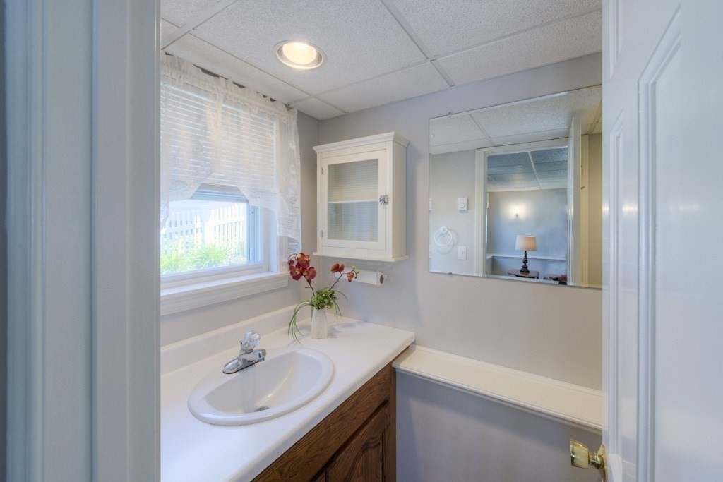 46 Eagle Road Worcester, MA 01605 - Photo 33 of 42 a bathroom with a sink and a mirror