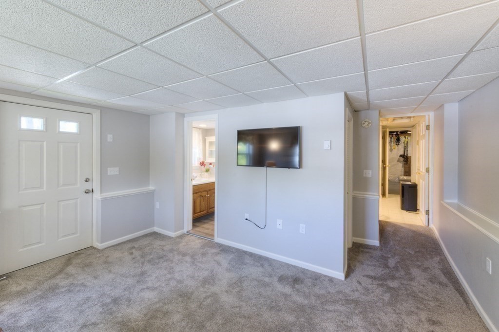 46 Eagle Road Worcester, MA 01605 - Photo 34 of 42 a view of a livingroom with wooden floor and a hallway