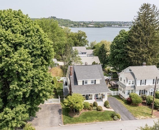 46 Eagle Road Worcester, MA 01605 - Photo 42 of 42 an aerial view of a house with lake view and a trees