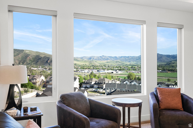851 Grandview Drive Morgan, UT 84050 - Photo 4 of 68 Multiple large windows frame expansive mountain and valley scenery